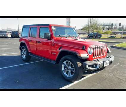 2021 Jeep Wrangler Unlimited Sahara is a Red 2021 Jeep Wrangler Unlimited Sahara SUV in Fenton MO
