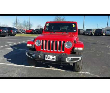 2021 Jeep Wrangler Unlimited Sahara is a Red 2021 Jeep Wrangler Unlimited Sahara SUV in Fenton MO