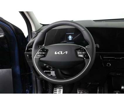 2024 Kia Niro SX Touring is a Blue 2024 Kia Niro SUV in Kennesaw GA