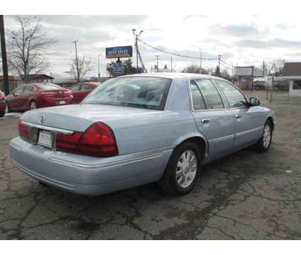 2003 Mercury Grand Marquis for sale is a Blue 2003 Mercury Grand Marquis Car for Sale in Ecorse MI