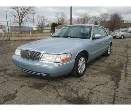 2003 Mercury Grand Marquis for sale is a Blue 2003 Mercury Grand Marquis Car for Sale in Ecorse MI