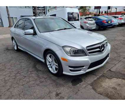 2014 Mercedes-Benz C-Class for sale is a Silver 2014 Mercedes-Benz C Class Car for Sale in Santa Ana CA