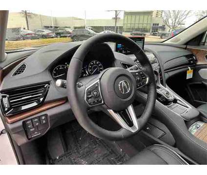 2024 Acura RDX Advance Package SH-AWD is a Silver, White 2024 Acura RDX Advance Package SUV in Houston TX