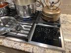 36" Wolf Stainless Steel Gas Cooktop, 5-burner, lighting control knobs