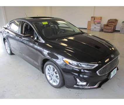 2020 Ford Fusion Plug-In Hybrid Titanium is a Black 2020 Ford Fusion Hybrid in Philadelphia PA