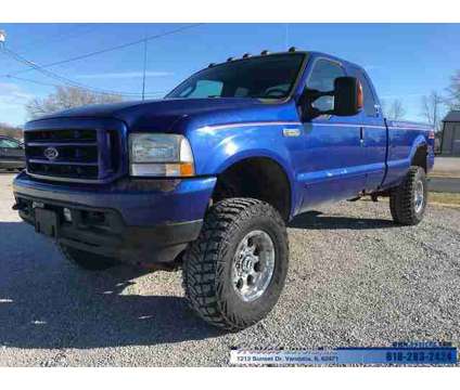 2003 Ford F-250SD XLT is a Blue 2003 Ford F-250 XLT Truck in Vandalia IL