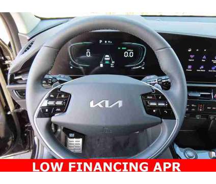 2024 Kia Niro EX Touring is a Black 2024 Kia Niro EX SUV in Oconomowoc WI