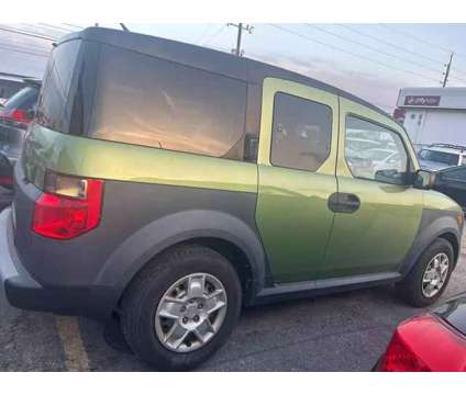 2006 Honda Element for sale is a Green 2006 Honda Element Car for Sale in Houston TX