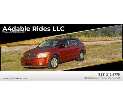 2007 Dodge Caliber for sale is a Orange 2007 Dodge Caliber Car for Sale in Haines City FL