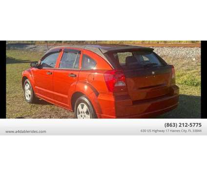 2007 Dodge Caliber for sale is a Orange 2007 Dodge Caliber Car for Sale in Haines City FL