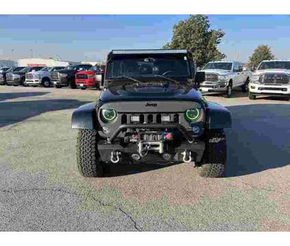 2015 Jeep Wrangler Unlimited Sahara is a Black 2015 Jeep Wrangler Unlimited Sahara SUV in Fort Smith AR