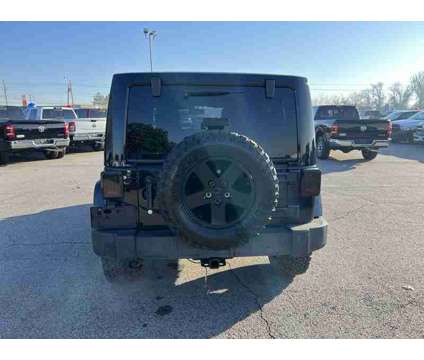 2015 Jeep Wrangler Unlimited Sahara is a Black 2015 Jeep Wrangler Unlimited Sahara SUV in Fort Smith AR