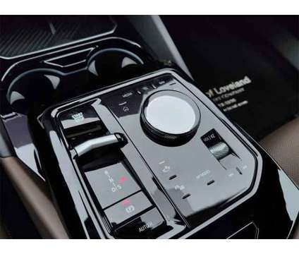 2024 BMW 5 Series i xDrive is a Black 2024 BMW 5-Series Sedan in Loveland CO