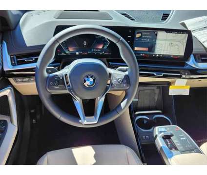 2024 BMW X1 xDrive28i is a Orange 2024 BMW X1 xDrive 28i SUV in Loveland CO