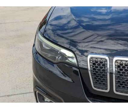 2019 Jeep Cherokee Limited FWD is a Black 2019 Jeep Cherokee Limited SUV in Naples FL