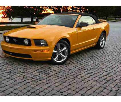 2007 Ford Mustang for sale is a Orange 2007 Ford Mustang Car for Sale in Duluth GA
