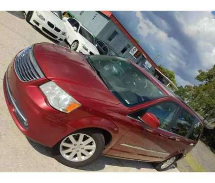 2015 Chrysler Town &amp; Country for sale is a Red 2015 Chrysler town &amp; country Car for Sale in Orlando FL
