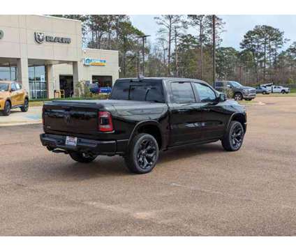 2024 Ram 1500 Limited is a Black 2024 RAM 1500 Model Limited Car for Sale in Mccomb MS