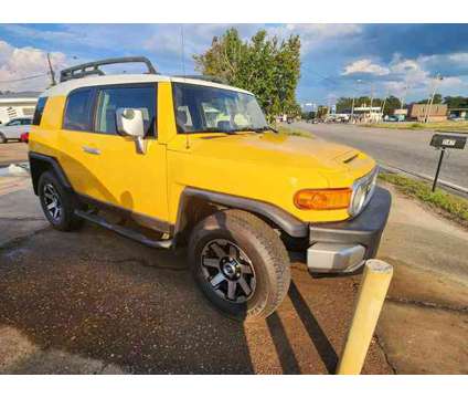 2007 Toyota FJ Cruiser for sale is a Yellow 2007 Toyota FJ Cruiser Car for Sale in Dothan AL