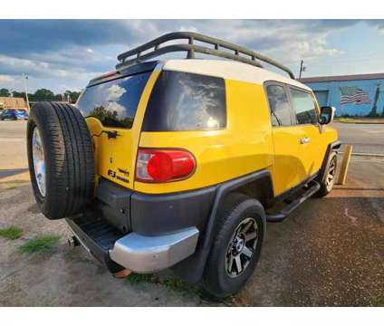 2007 Toyota FJ Cruiser for sale is a Yellow 2007 Toyota FJ Cruiser Car for Sale in Dothan AL
