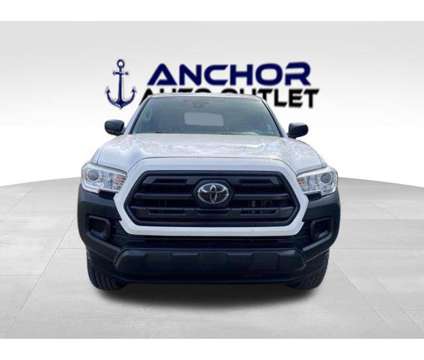 2018 Toyota Tacoma SR5 is a White 2018 Toyota Tacoma SR5 Truck in Cary NC