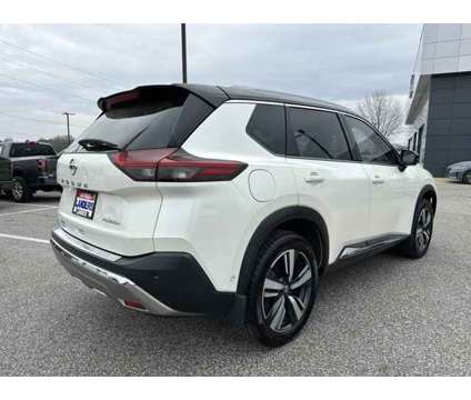 2021 Nissan Rogue Platinum is a Black, White 2021 Nissan Rogue Car for Sale in Southaven MS