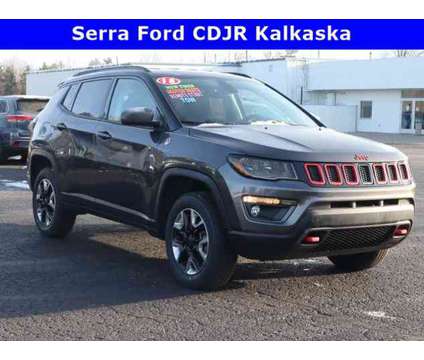2018 Jeep Compass Trailhawk is a Grey 2018 Jeep Compass Trailhawk Car for Sale in Traverse City MI