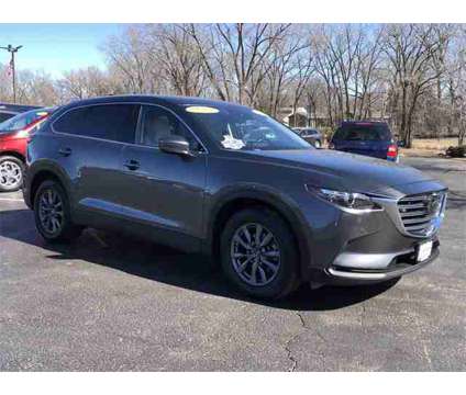 2021 Mazda CX-9 Touring is a Grey 2021 Mazda CX-9 Touring SUV in Neenah WI