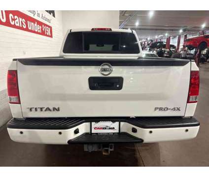 2015 Nissan Titan SV is a White 2015 Nissan Titan SV Truck in Chandler AZ