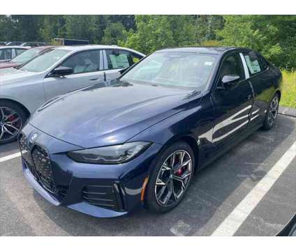 2024 BMW i4 M50 is a Blue 2024 Sedan in Shrewsbury MA