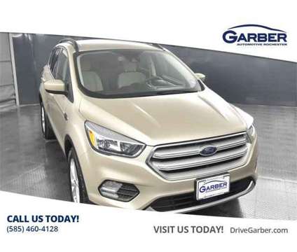 2018 Ford Escape SE is a Gold, White 2018 Ford Escape SE SUV in Rochester NY