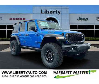 2024 Jeep Wrangler Willys is a Blue 2024 Jeep Wrangler Car for Sale in Pataskala OH