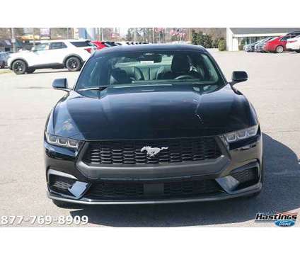 2024 Ford Mustang EcoBoost Premium is a Black 2024 Ford Mustang EcoBoost Premium Coupe in Greenville NC