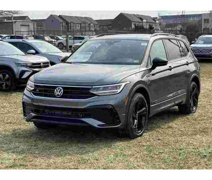 2024 Volkswagen Tiguan SE R-Line Black is a Grey, Silver 2024 Volkswagen Tiguan SE SUV in Sterling VA