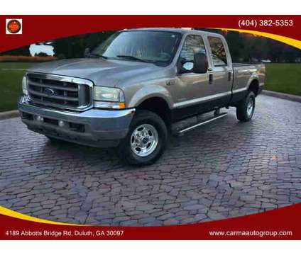 2004 Ford F350 Super Duty Crew Cab for sale is a Gold 2004 Ford F-350 Super Duty Car for Sale in Duluth GA