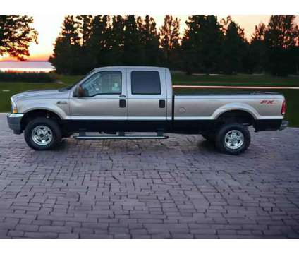 2004 Ford F350 Super Duty Crew Cab for sale is a Gold 2004 Ford F-350 Super Duty Car for Sale in Duluth GA