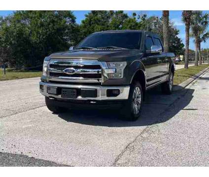 2015 Ford F150 SuperCrew Cab for sale is a Green 2015 Ford F-150 SuperCrew Car for Sale in Orlando FL