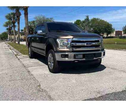 2015 Ford F150 SuperCrew Cab for sale is a Green 2015 Ford F-150 SuperCrew Car for Sale in Orlando FL