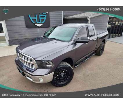 2016 Ram 1500 Quad Cab for sale is a Grey 2016 RAM 1500 Model Car for Sale in Commerce City CO