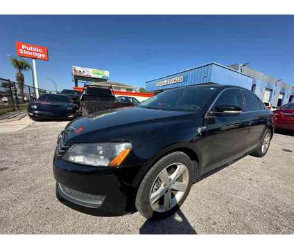 2014 Volkswagen Passat for sale is a Black 2014 Volkswagen Passat Car for Sale in Orlando FL
