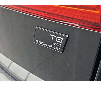 2024 Volvo XC60 Recharge Plug-In Hybrid Ultimate Black Edition is a Black 2024 Volvo XC60 3.2 Trim Hybrid in Auburn MA