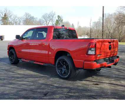 2020 Ram 1500 Big Horn is a Red 2020 RAM 1500 Model Big Horn Car for Sale in Paw Paw MI