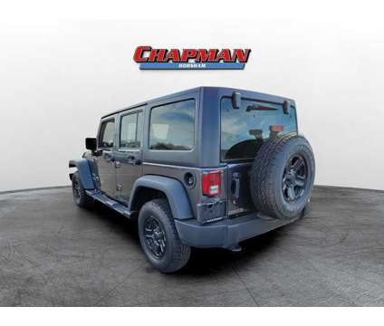 2017 Jeep Wrangler Unlimited Sport is a Grey 2017 Jeep Wrangler Unlimited Sport Car for Sale in Horsham PA