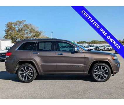 2017 Jeep Grand Cherokee Overland is a Brown 2017 Jeep grand cherokee Overland Car for Sale in Sarasota FL