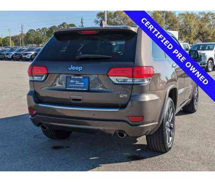 2017 Jeep Grand Cherokee Overland is a Brown 2017 Jeep grand cherokee Overland Car for Sale in Sarasota FL