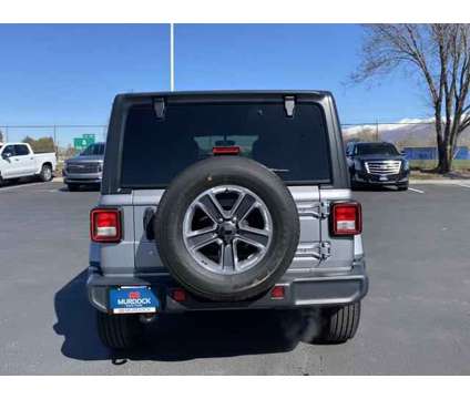 2020 Jeep Wrangler Unlimited Sahara 4X4 is a Silver 2020 Jeep Wrangler Unlimited Sahara SUV in Woods Cross UT