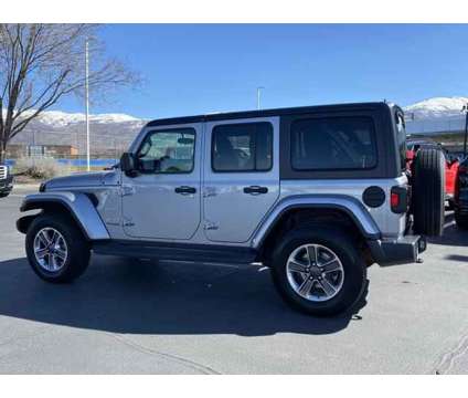 2020 Jeep Wrangler Unlimited Sahara 4X4 is a Silver 2020 Jeep Wrangler Unlimited Sahara SUV in Woods Cross UT