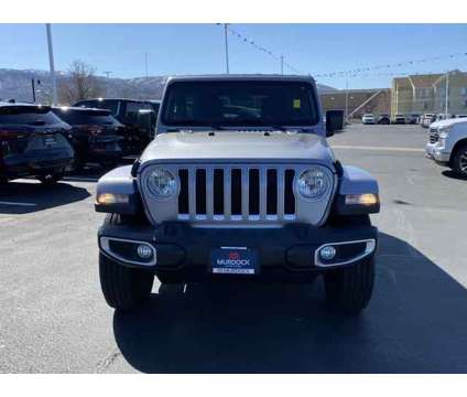 2020 Jeep Wrangler Unlimited Sahara 4X4 is a Silver 2020 Jeep Wrangler Unlimited Sahara SUV in Woods Cross UT
