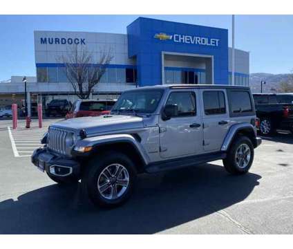 2020 Jeep Wrangler Unlimited Sahara 4X4 is a Silver 2020 Jeep Wrangler Unlimited Sahara SUV in Woods Cross UT