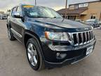 2012 Jeep Grand Cherokee Limited Luxury meets power with 4WD and HEMI V8 engine.